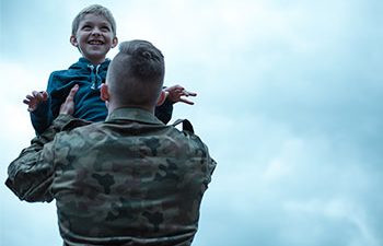 Military father with child