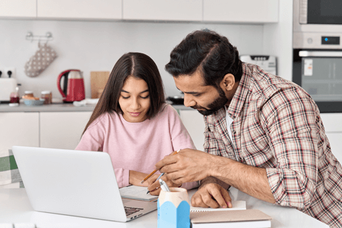 Parent talking with child about back to school COVID co-parenting