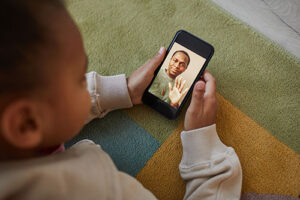 father calling daughter over facetime for virtual visitation